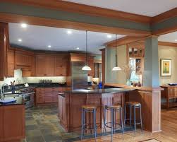 Black And Natural Wood Kitchen Cabinets Wow I Love Natural Wood Cabinets Dark Counter Slate Floor Also Like The Peninsula This Kitchen Is Craftsman Kitchen Kitchen Flooring Bungalow Kitchen