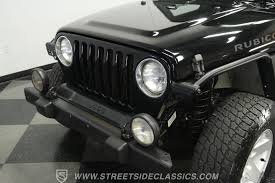Image result for Brilliant Black 2005 Jeep