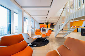 The Health Minded Approach To Pwc Switzerland S Bright New Workspace Office Interior Design Commercial Office Design Office Space Design