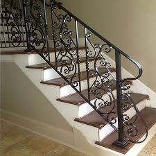 The stairs made of jerusalem stone wrap around a french crystal chandelier. Stair Railing Design Wrought Iron Spiral Stairway Iron Craft Stair Railings Gorgeous Design High Quality Wrought Iron Outdoor St Buy Wrought Iron Spiral Staircase Railing Stair Railing And Spiral Staircase Spiral Staircase Railing