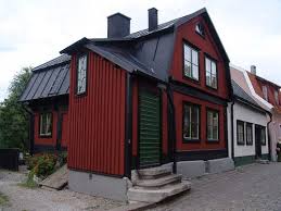 red house with black trim | House exterior color schemes, Swedish ...