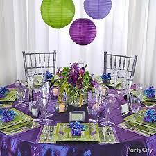 Wedding Reception Decorating Ideas In Romantic Purple And Green Party City Purple And Green Wedding Wedding Table Settings Purple Purple Wedding Tables