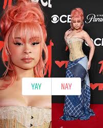 Only Ice Spice could make 2003 feel brand new 😍 We love a pink hair  moment. Is this a yay or nah for you?