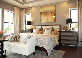 Bright blue headboard in a cottage bedroom flanked by a set of light oak nightstands displaying white and gold task lamps and decorative accents. Ways To Add Glitz And Gold Your Home Interior White Bedroom Atmosphere Ideas Visuals Numbers Numder Strategies Easy Way Fractions Different Subtract Apppie Org