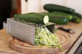 Use the large holes of a box grater or the large grating disc of a food processor to shred the zucchini. Embracing The Zucchini Glut And A Recipe For Zucchini Bread And Butter Pickles Little Eco Footprints