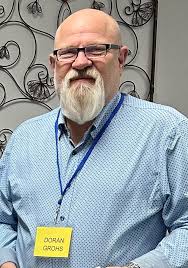 THE FIFTH ROTARIAN Meet Harry Ruggles, he was the fifth Rotarian. Being a  printer, he designed the first Rotary wheel emblem. Ruggles was at the  second meeting of Rotary and Paul Harris