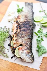 Carefully attempt to lift fish from below; Grilled Whole Trout Trout Recipes Bbq Recipes Seafood Recipes