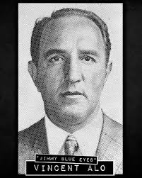 Vincent “Jimmy Blue Eyes” Alo operated for decades alongside Meyer Lansky  and Charles “Lucky” Luciano while staying well outside of the spotlight.  Born in East Harlem in 1904, Alo built a quiet