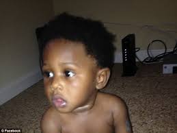 Atlanta toddler, 1, is caught in a gunfight and struck in the arm by a  stray bullet