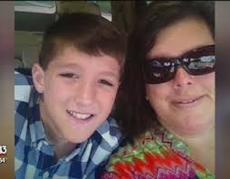 Boy who lost his mother last year wins with grand champion pig