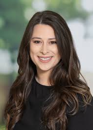 Meet Sidney Holmes of Harry Norman