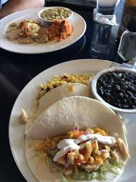 Guac, baja fish taco, tempura shrimp taco, and a flight of tequila. Fish Tacos Picture Of Fleet Landing Restaurant Charleston Tripadvisor