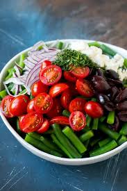 Green Beans Cherry Tomatoes Red Onion Olives And Feta Cheese In A Bowl Green Beans Green Bean Salad Recipes Green Bean Recipes