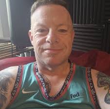 Generous boy helps homeless man with new shoes