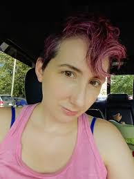 I had an accident a few months back ~ opted to have my brace made in PINK,  of course! I decided to get my hair braided today so I don't have to