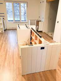 The cabinet is the middle has a 5″ drawer on the top and a 10″ drawer on the bottom, with a shelf just above the bottom drawer. How To Create A Custom Ikea Kitchen Island House With Home