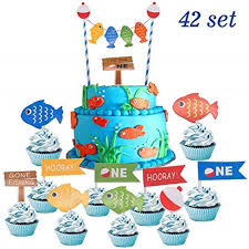 With a few flicks of the spatula, you can create scale and fin textures for a swimmingly handsome fish cake. Fish Themed Birthday Party Decorations Supplies For Kids Baby Shower Glitter The Big One Gone Fishing Birthday Banner Little Fisherman Hook Highchair Banner 1 St First Birthday Fishing Cake Topper Party Supplies