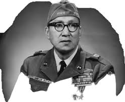 Cpl. Ethan Nagel, a Prior Lake, Minn. native, poses for a photo with his  grandfather, retired Marine and Korean War veteran Richard Allen, and  Brigadier General James S. Hartsell, commanding general of