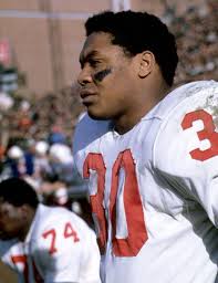 Boston Patriots running back Carl Garrett. Garrett was involved in a highly  unusual trade just prior to the 1971 season. The Patriots traded Garrett to  the Dallas Cowboys for running back Duane