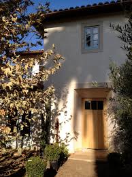 Arched door arched windows asian inspired asphalt driveway back view balcony bay window beach house birdhouse black columns black fascia. Modern Mediterranean House Velvet Linen