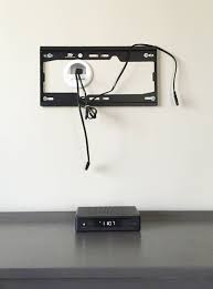 The tv is rarely the only piece of equipment you need. Clear The Clutter How To Hide Tv Wires And Cords Guest Post From Young House Love Roku