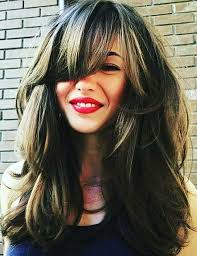 Long bangs play up hair's natural thickness and blend seamlessly into the rest of the style, making this one of the most wearable takes on side swept bangs. 20 Hairstyles With Side Swept Bangs That Will Sweep You Off Your Feet