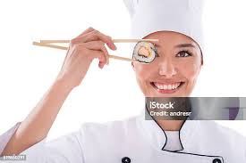 Koki Wanita Asia Yang Cantik Dengan Sumpit Dan Bac Makanan Jepang Foto Stok 