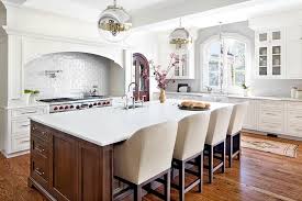 Cherry wood was a traditional part of american furniture and fine cabinets, recognized by early colonial cabinetmakers for its superior woodworking qualities. White Kitchen With Cherry Island Design Ideas