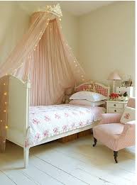 Wooden bed with curtains for boho bedroom. Bedroom Fairy Light Ideas From Vintage To Quirky Lights4fun Co Uk