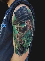 Modern Traditional Style Colored Shoulder Tattoo Of Fantasy Man With Mask And Green Fox Doctor Tattoo Steampunk Tattoo Tattoos