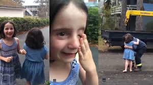 Heartwarming video shows Australian firefighter reuniting with daughters  after leaving to battle flames