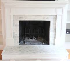 This marble fireplace tile surround makes a large impact in a small space. How To Tile Over A Brick Hearth Shine Your Light