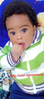 Cute baby with fingers in mouth