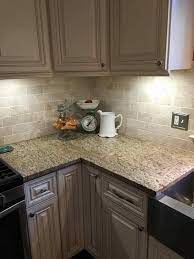 Detail insets introduce a visual spark to a simple kitchen backsplash while staying within your price range. Move Over White Taupe Kitchen Backsplash Ideas Are In