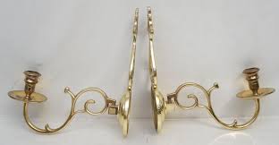Antique brass strap connor hurricane wall sconce. Sold Price Baldwin Brass Williamsburg Candle Sconces Invalid Date Est