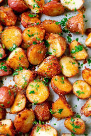 Roasted Garlic Butter Parmesan Potatoes These Epic Roasted Potatoes With Garlic Butter Parme Roasted Potato Recipes Potato Side Dishes Parmesan Potato Recipe