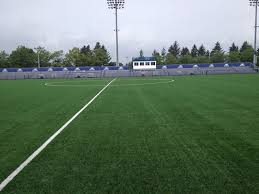 In the center of the field a 10 yard circle marks the area where defenders must stay outside of at the start of a kickoff. Hofstra Soccer Stadium Hofstra University Athletics