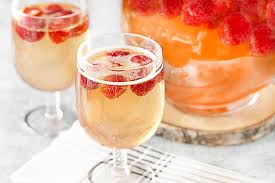 Add 1 cup of the sugar and the water to a saucepan over medium heat. Party Punch Recipe Strawberry Champagne Punch