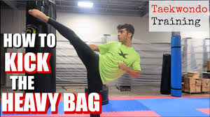 to kick the heavy bag taekwondo mma