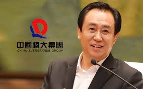 Evergrande says billionaire founder is suspected of crimes