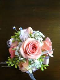 Not only do the tiny blooms provide lovely, delicate filler for more intricate floral arrangements and bouquets; Light Pink Rose Wristlet Corsage In Tillamook Or Anderson Florist