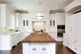 Summer is almost gone but there's still time to save! White Kitchen Island With Butcher Block Top Variations And Uses Goodworksfurniture In 2020 White Kitchen Island Kitchen Island Countertop Kitchen Style