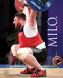 The georgian snatched 223kg, the first world record, then lifted 265kg in the clean and jerk, the second world's best, which couldn't help but result in a world record total of 488kg. June Milo Lasha Talakhadze Cover Story