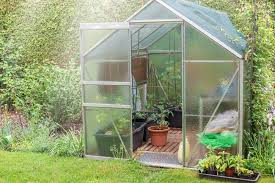 This charming little greenhouse is made from 4 window panels and 2 plywood panels. Diy Greenhouse Instructions And Hints My Garden Guide
