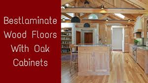 It was the 90s when gray was trendy but the grey created a nice balance of warm and cool combined with the yellow cabinets and floors. Bestlaminate Wood Floors With Oak Cabinets