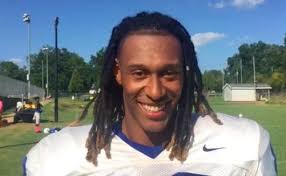 Clayton moves forward after defeating Garner