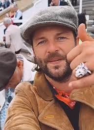 Darren Shenk Supports Young Fans with Custom Shirt for Wells Motorsports