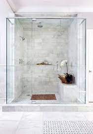 This mosaic tile brings movement and fun and serves as an interesting contrast to the more organic flower wallpaper. Top 70 Best Marble Bathroom Ideas Luxury Stone Interiors