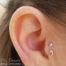 A Set Of Tragus Piercings Made The Perfect Home For This Solid White Gold Semicolon By Bvla Pie Earings Piercings Cute Ear Piercings Types Of Ear Piercings