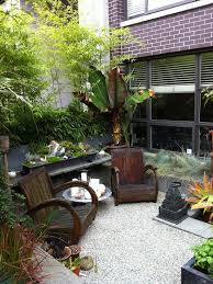 If tropical settings are what you enjoy, why not experience them every day in the privacy of your own backyard? Nothing Contributes More To The Ambiance Than Artistic Patio Design And For Many People An A Balinese Garden Garden Landscape Design Tropical Landscape Design